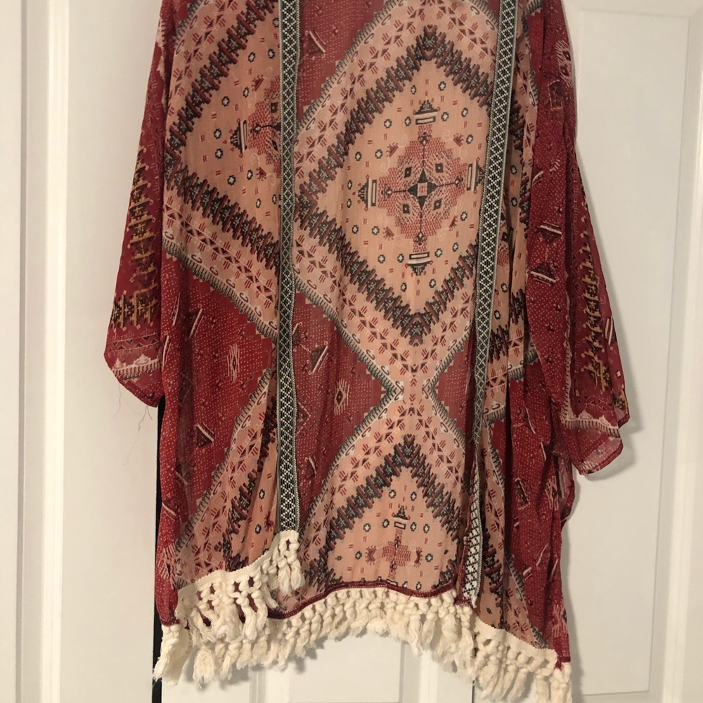 Maroon Cardigan with white fringe on bottom